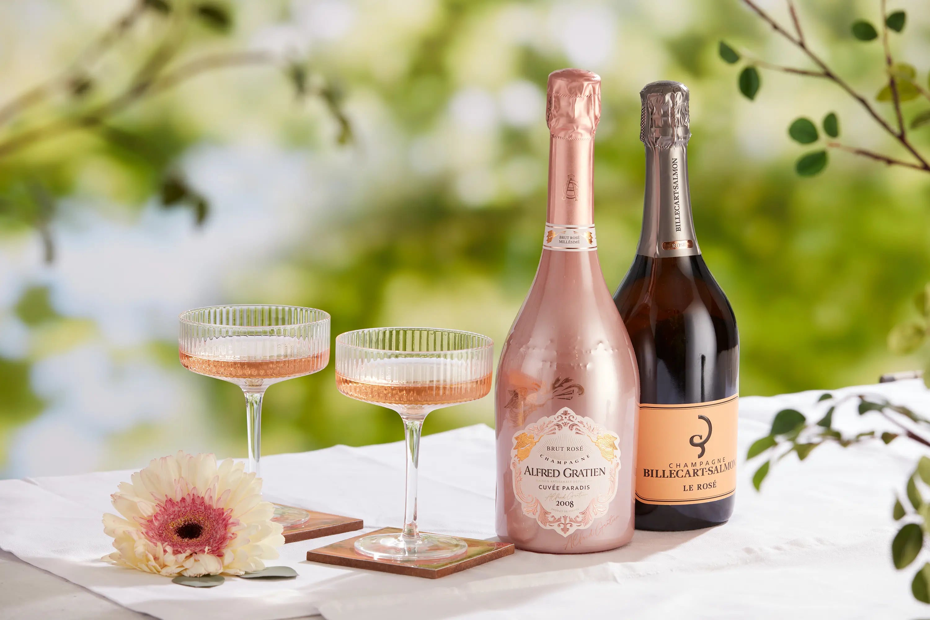 Rosé Champagne served outdoors, featured in a guide to serving wine at the right temperature this summer.