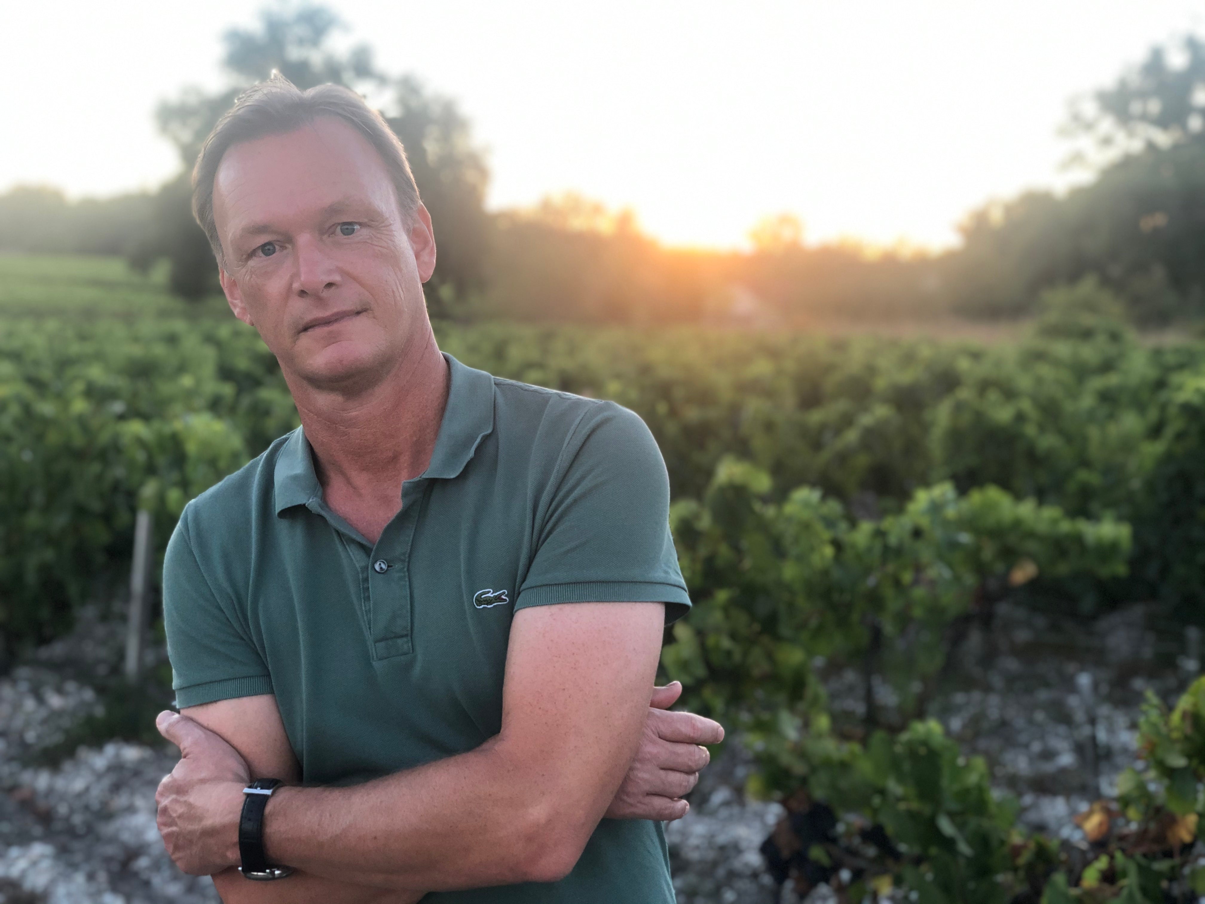 Winemaker Arjen Pen in the Marpaout vineyard at sunset in Moulis, Bordeaux.